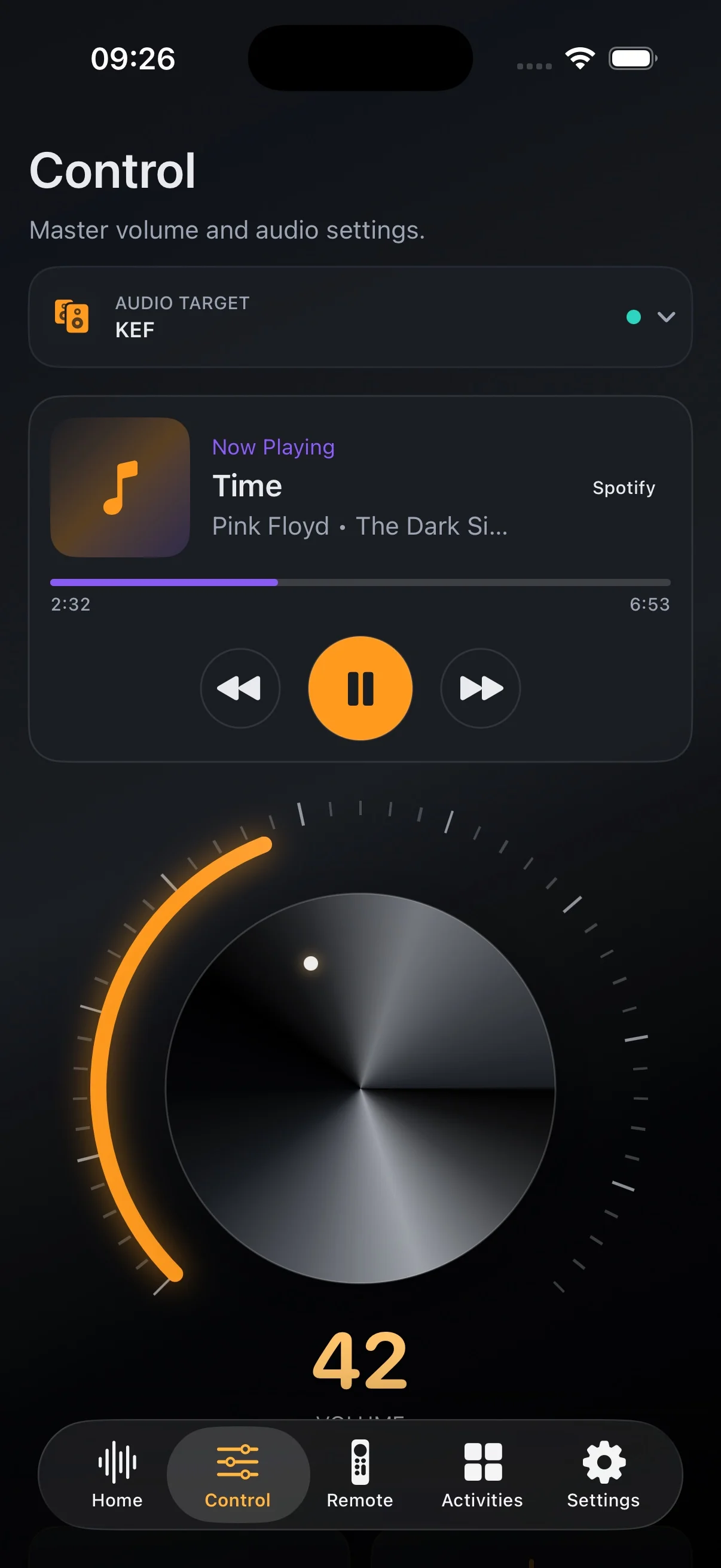 Tactra Control on iPhone with an amber volume arc and large rotary knob